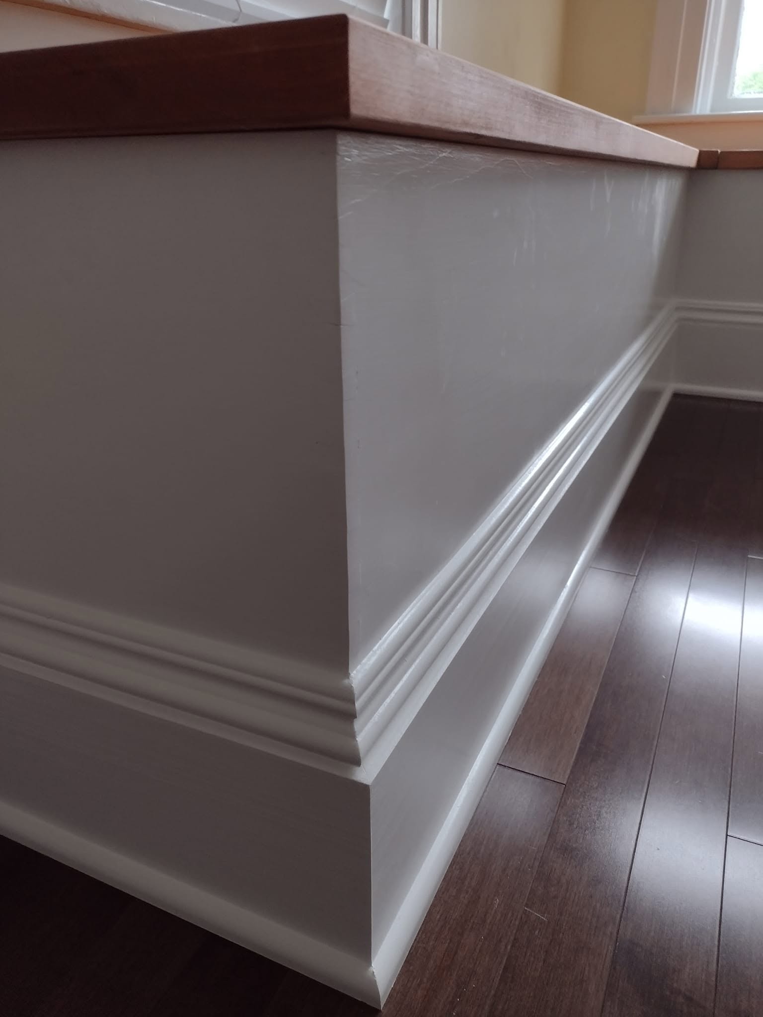 Meticulous corner baseboard trim installation