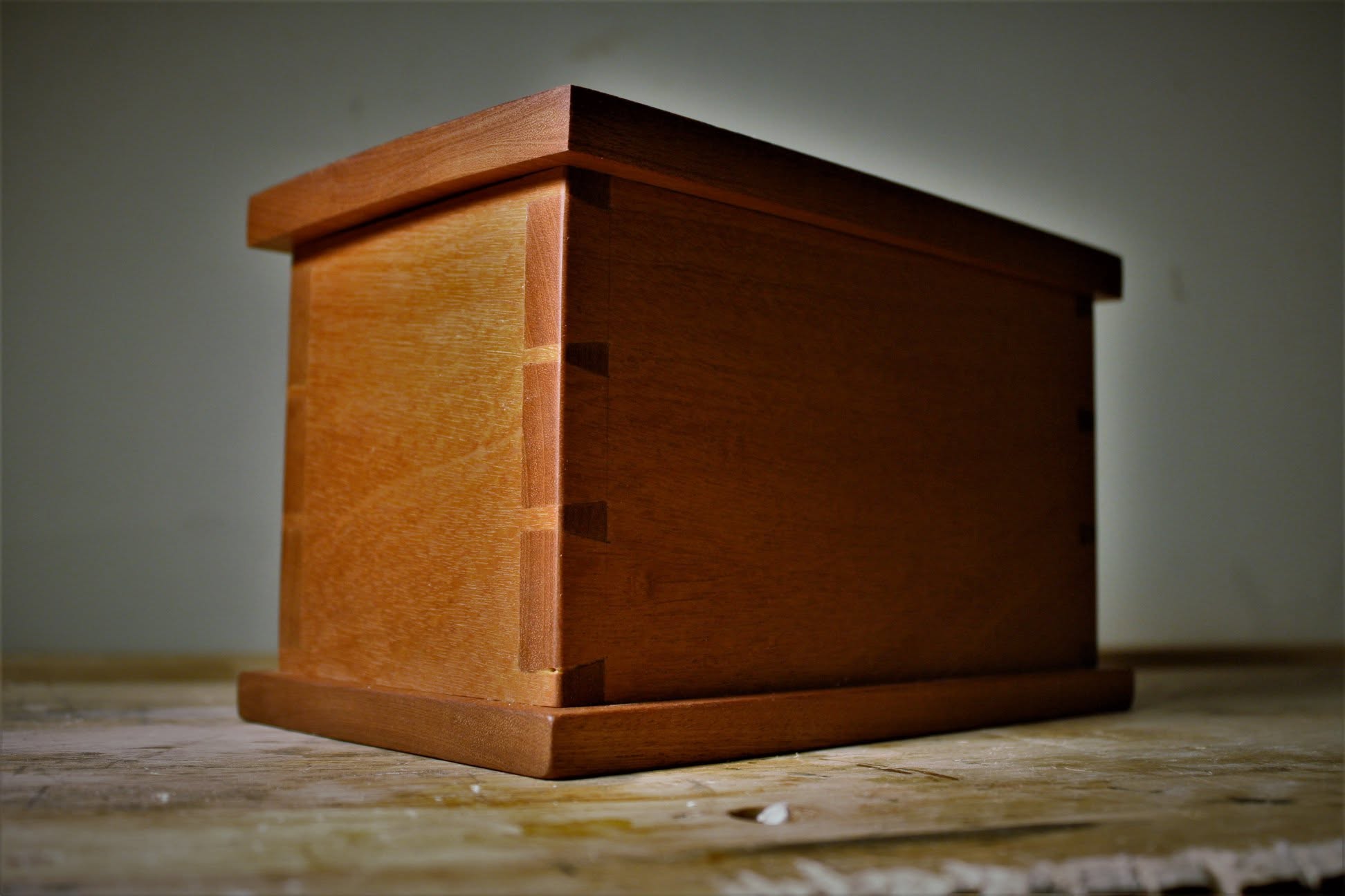 Solid wood box showing hand-cut dovetail joints